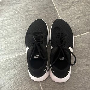 Black Nike tennis shoes (size 4.5)